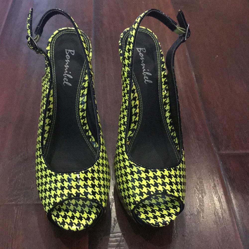 neon green and black stilettos